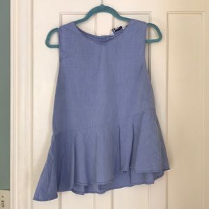 Light blue diagonal peplum tank with button back